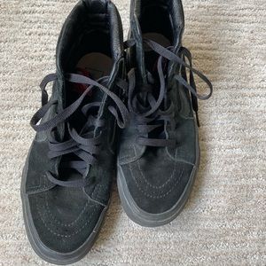 Black high tops Vans